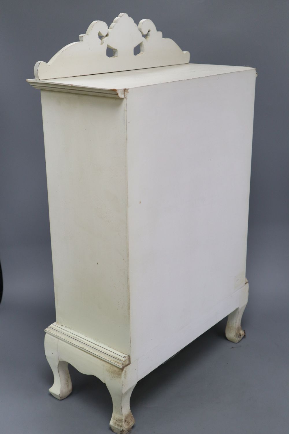 A collection of Victorian Staffordshire childrens blue and white tea ware, in a miniature armoire, height 59cm